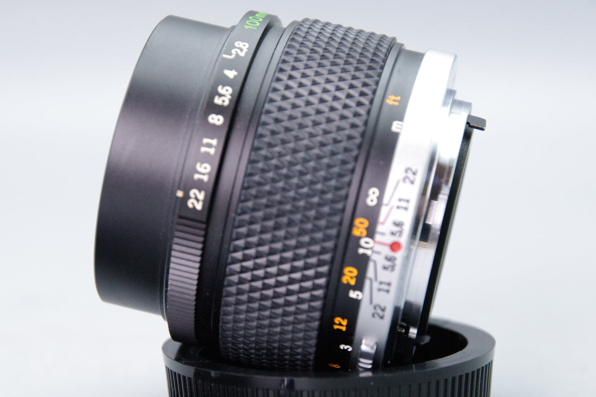 Olympus Zuiko Auto‑T 100mm f/2.8 Lens – OM Mount – With Both Caps & Case