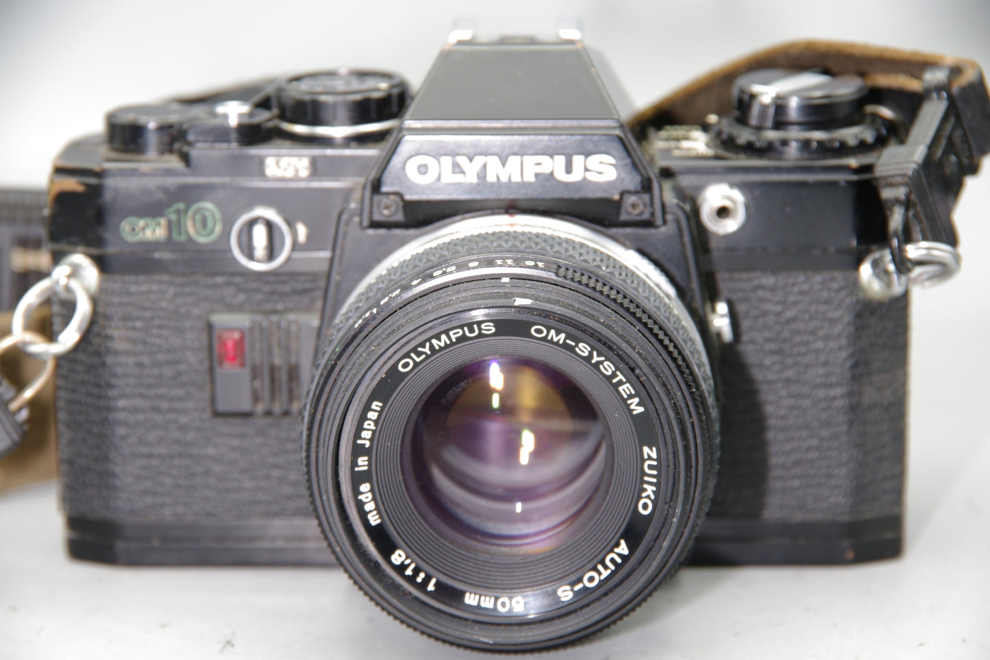 Black Olympus OM10 35mm SLR Camera + 50mm F/1.8 Lens + Batteries