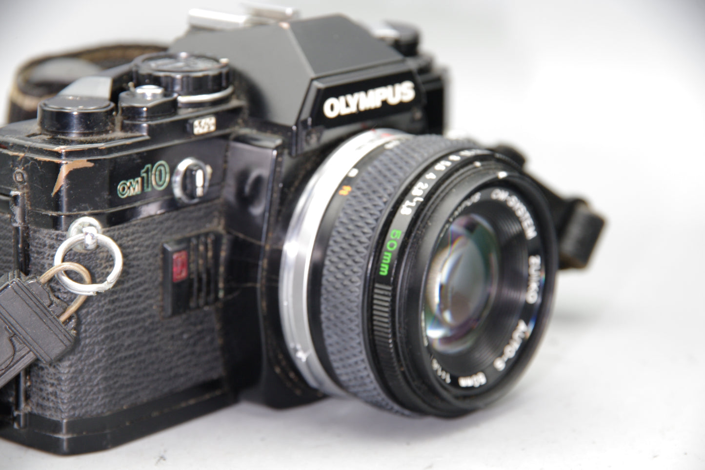 Black Olympus OM10 35mm SLR Camera + 50mm F/1.8 Lens + Batteries