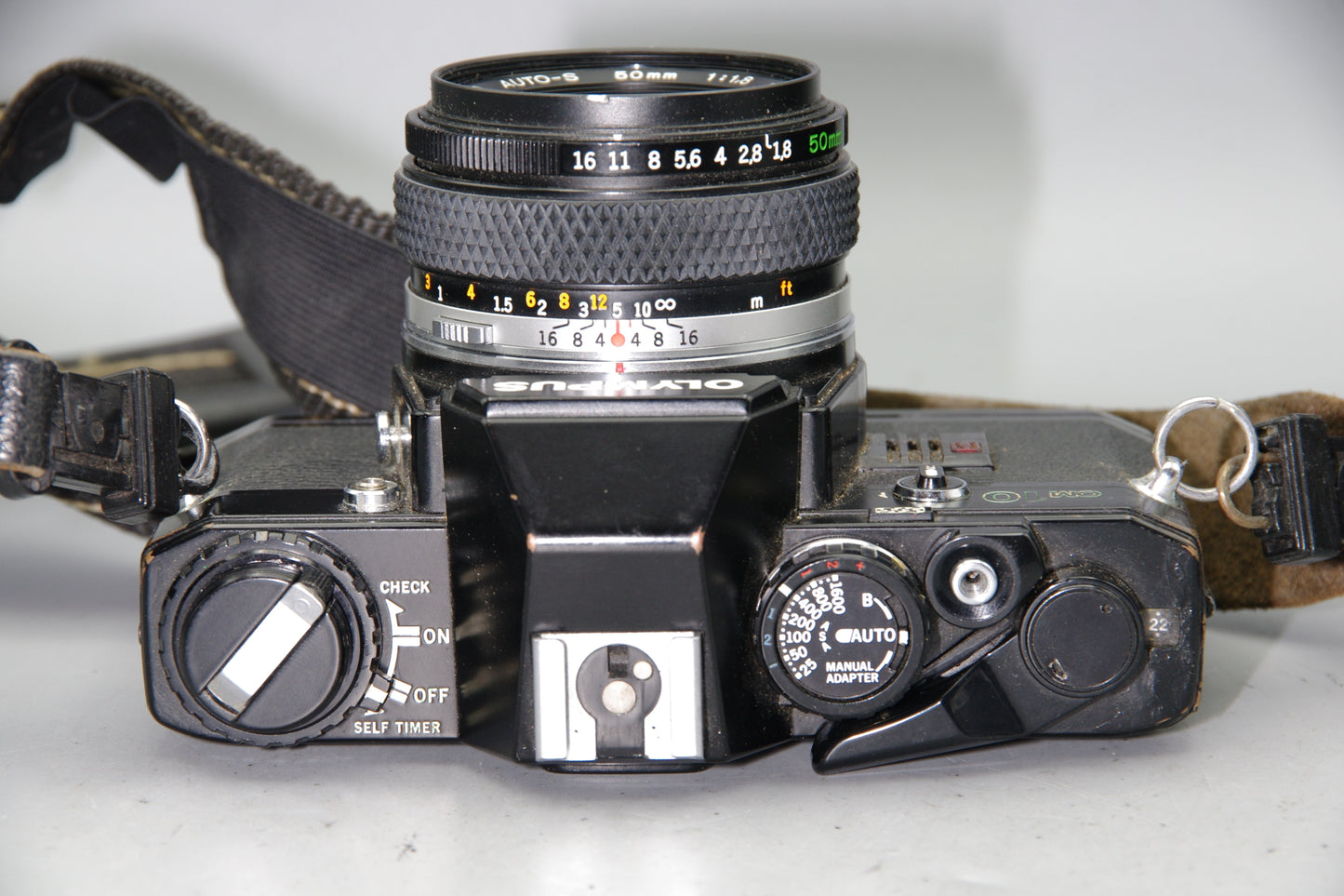 Black Olympus OM10 35mm SLR Camera + 50mm F/1.8 Lens + Batteries