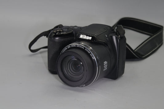 Nikon Coolpix L120 14.1MP Digital Bridge Camera – 21x Zoom, HD Video, Takes AA Batteries