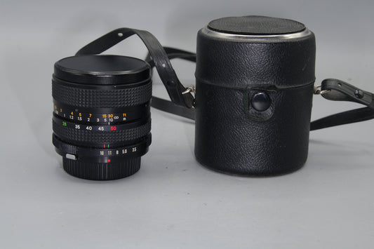 Super Paragon PMC 28–50mm f/3.5–4.5 Zoom Lens – OM Mount, Manual Focus