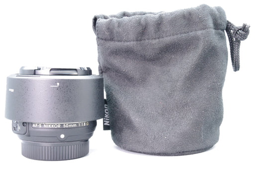 Nikon AF Nikkor 50mm f/1.8G Lens – Excellent Condition – Caps + Hood