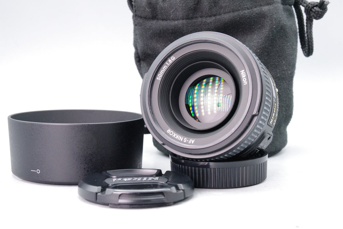 Nikon AF Nikkor 50mm f/1.8G Lens – Excellent Condition – Caps + Hood