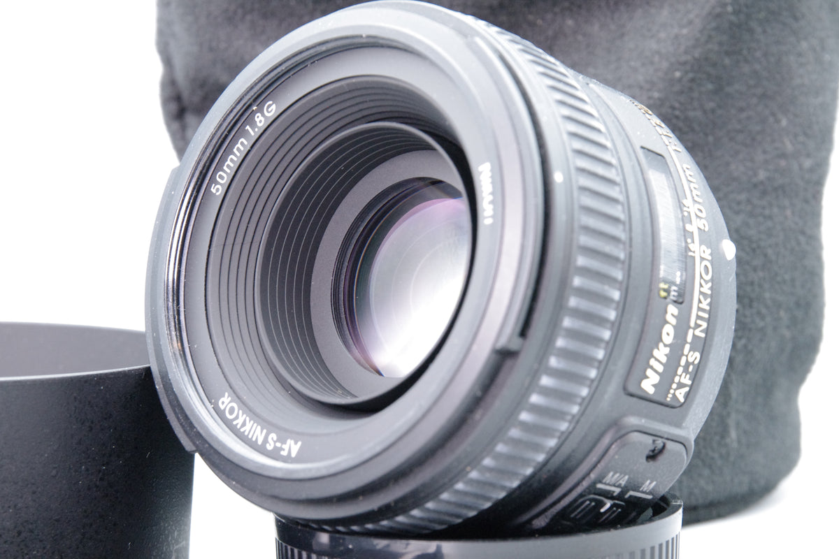 Nikon AF Nikkor 50mm f/1.8G Lens – Excellent Condition – Caps + Hood