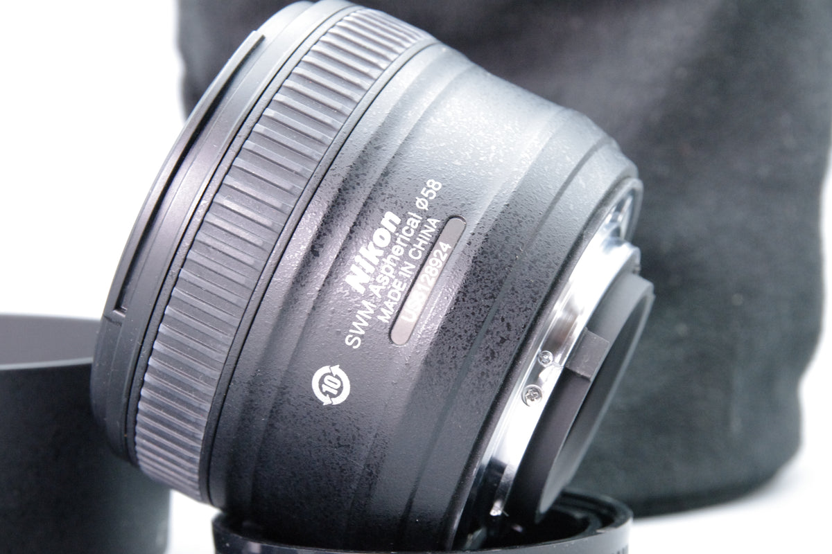 Nikon AF Nikkor 50mm f/1.8G Lens – Excellent Condition – Caps + Hood