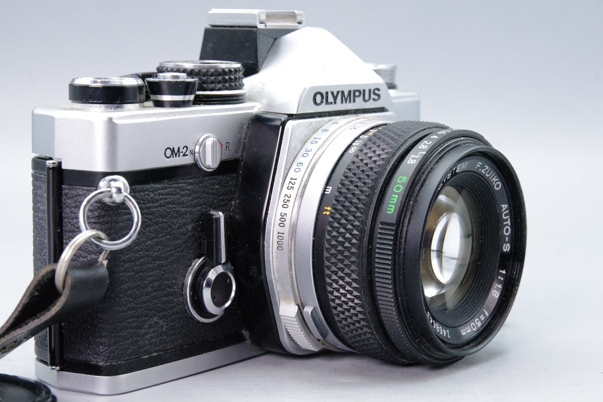 Olympus OM-2N 35mm SLR + Zuiko 50mm f/1.8 Lens – Tested & New Batteries