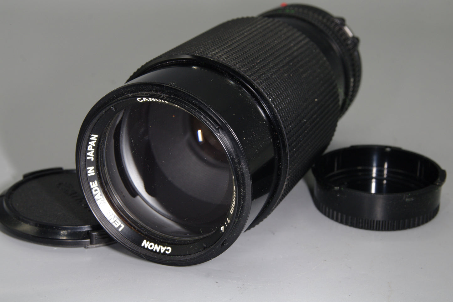 Canon FD 70–210mm f/4 Telephoto zoom with macro, constant f/4 – excellent shape.