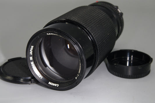 Canon FD 70–210mm f/4 Telephoto zoom with macro, constant f/4 – excellent shape.