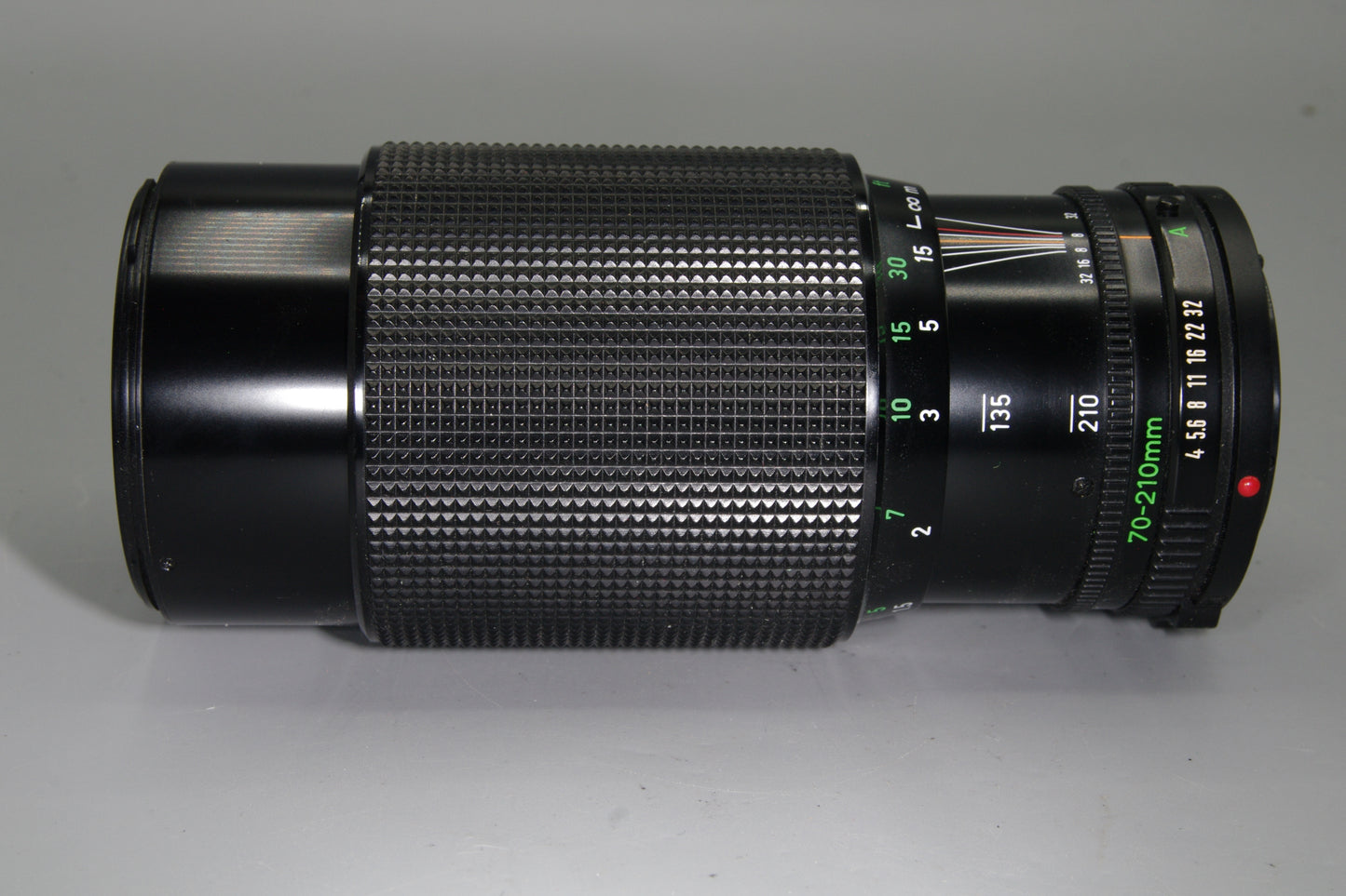 Canon FD 70–210mm f/4 Telephoto zoom with macro, constant f/4 – excellent shape.