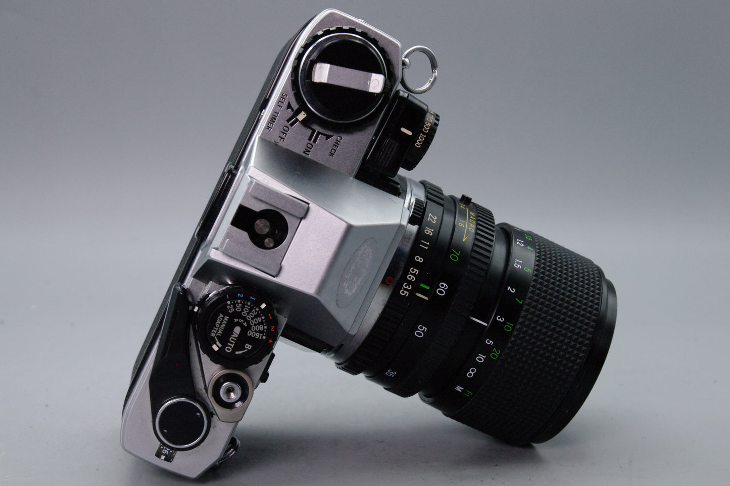 Olympus OM10 35mm SLR Camera + Miranda 35–70mm Lens + Manual Adapter + Batteries