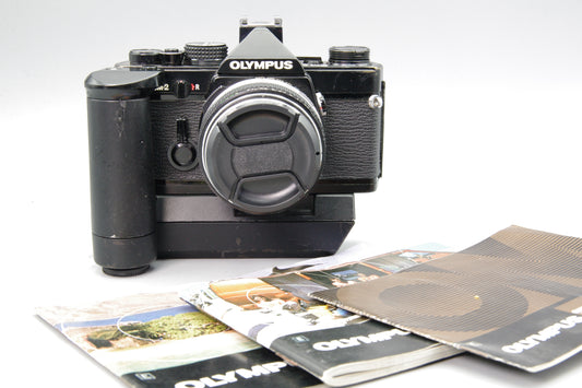 Black Olympus OM‑2 35mm SLR + Zuiko 50mm f/1.8 Lens & Winder 1
