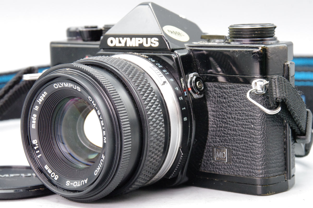 Olympus OM‑1N Black 35mm SLR Film Camera with Zuiko 50mm f/1.8 Lens – VGC