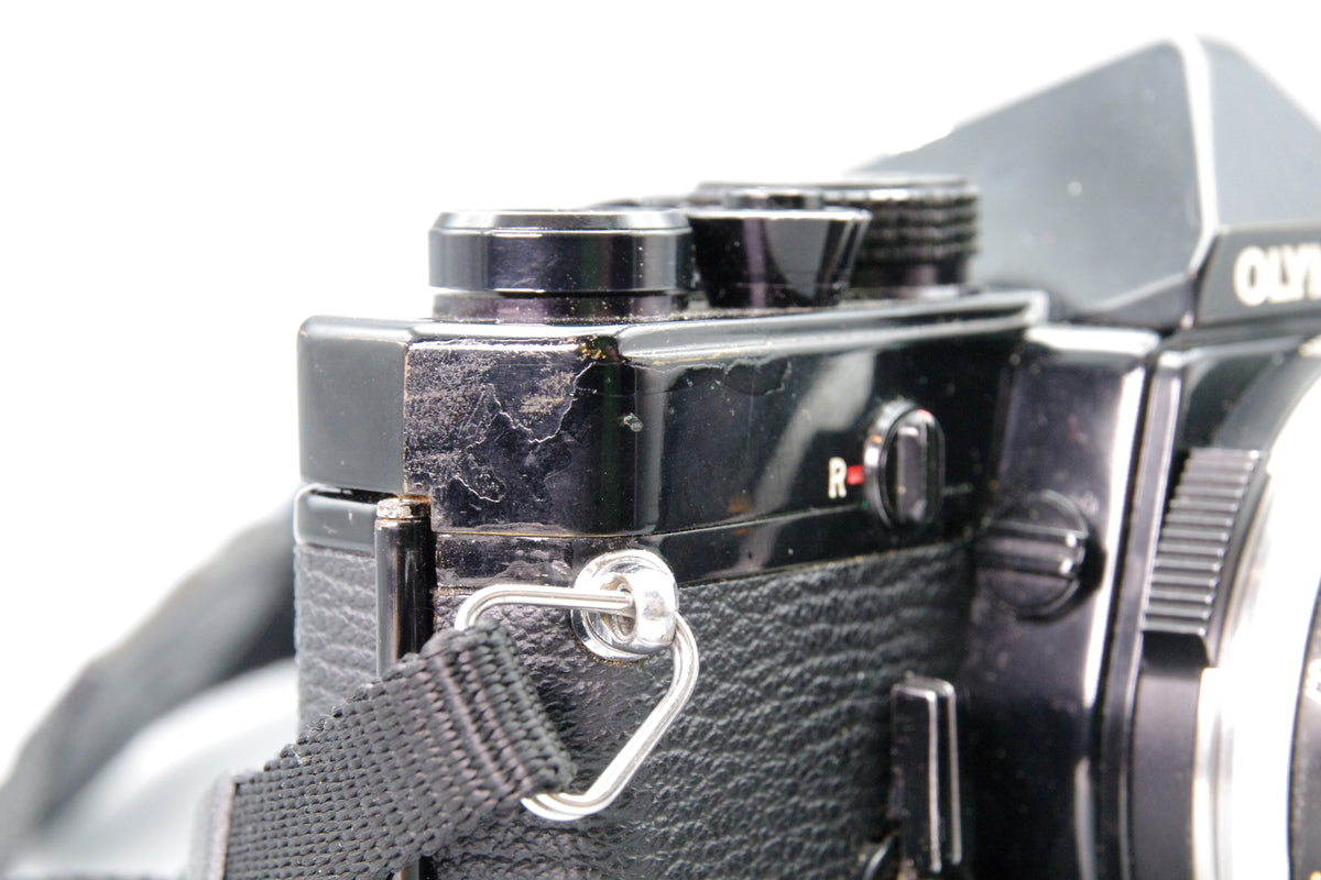 Olympus OM‑1N Black 35mm SLR Film Camera with Zuiko 50mm f/1.8 Lens – VGC