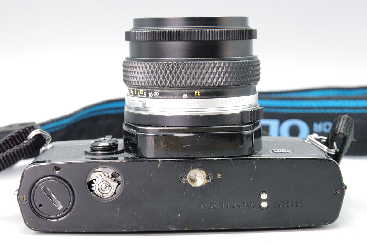 Olympus OM‑1N Black 35mm SLR Film Camera with Zuiko 50mm f/1.8 Lens – VGC