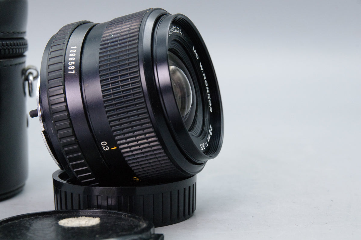 Minolta MD W.Rokkor 28mm f/2.8 Lens with Case – Excellent