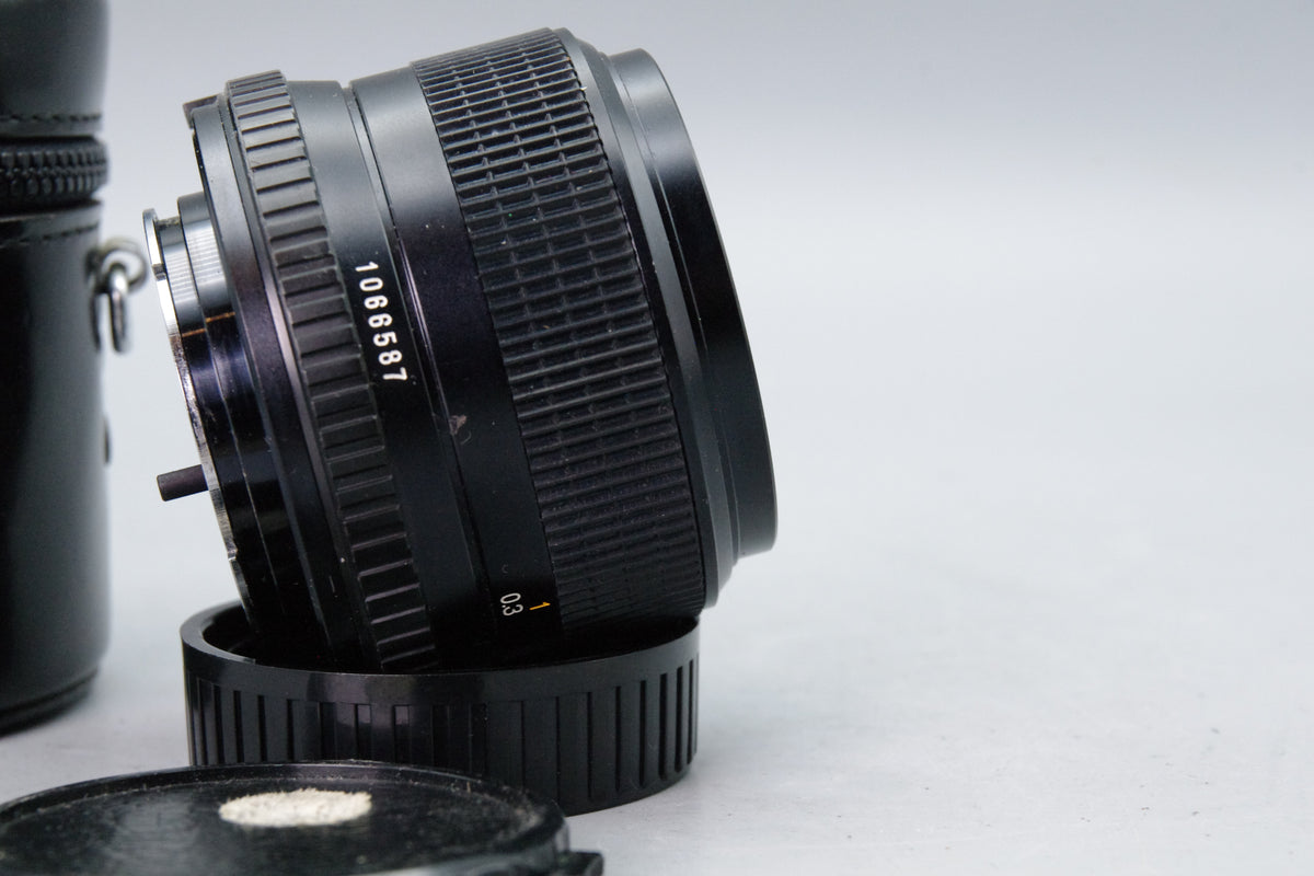 Minolta MD W.Rokkor 28mm f/2.8 Lens with Case – Excellent