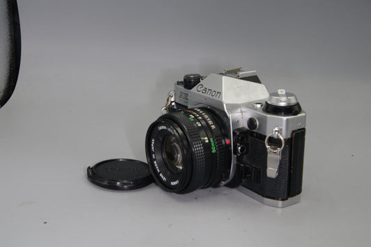 Canon AE-1 Program + FD 50mm f/1.8 Lens  Excellent – Tested
