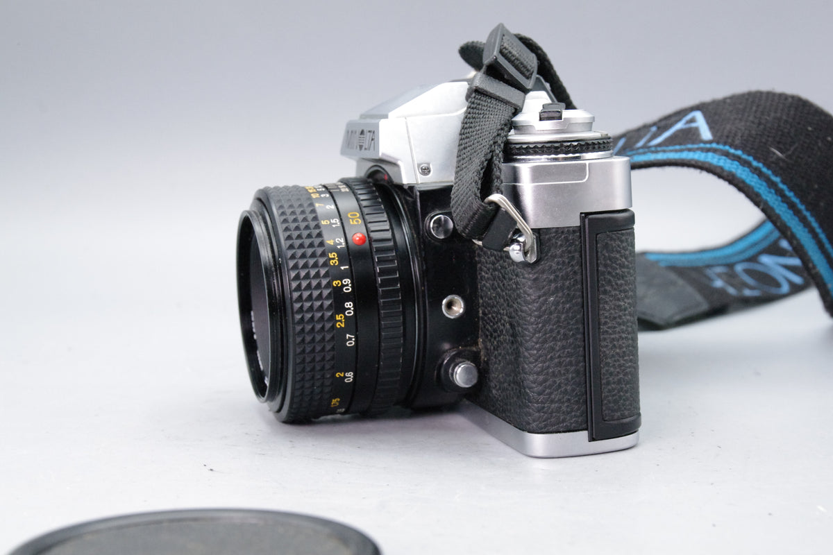 Minolta XG‑M 35mm SLR + MD 50mm f/1.7 Lens – Excellent