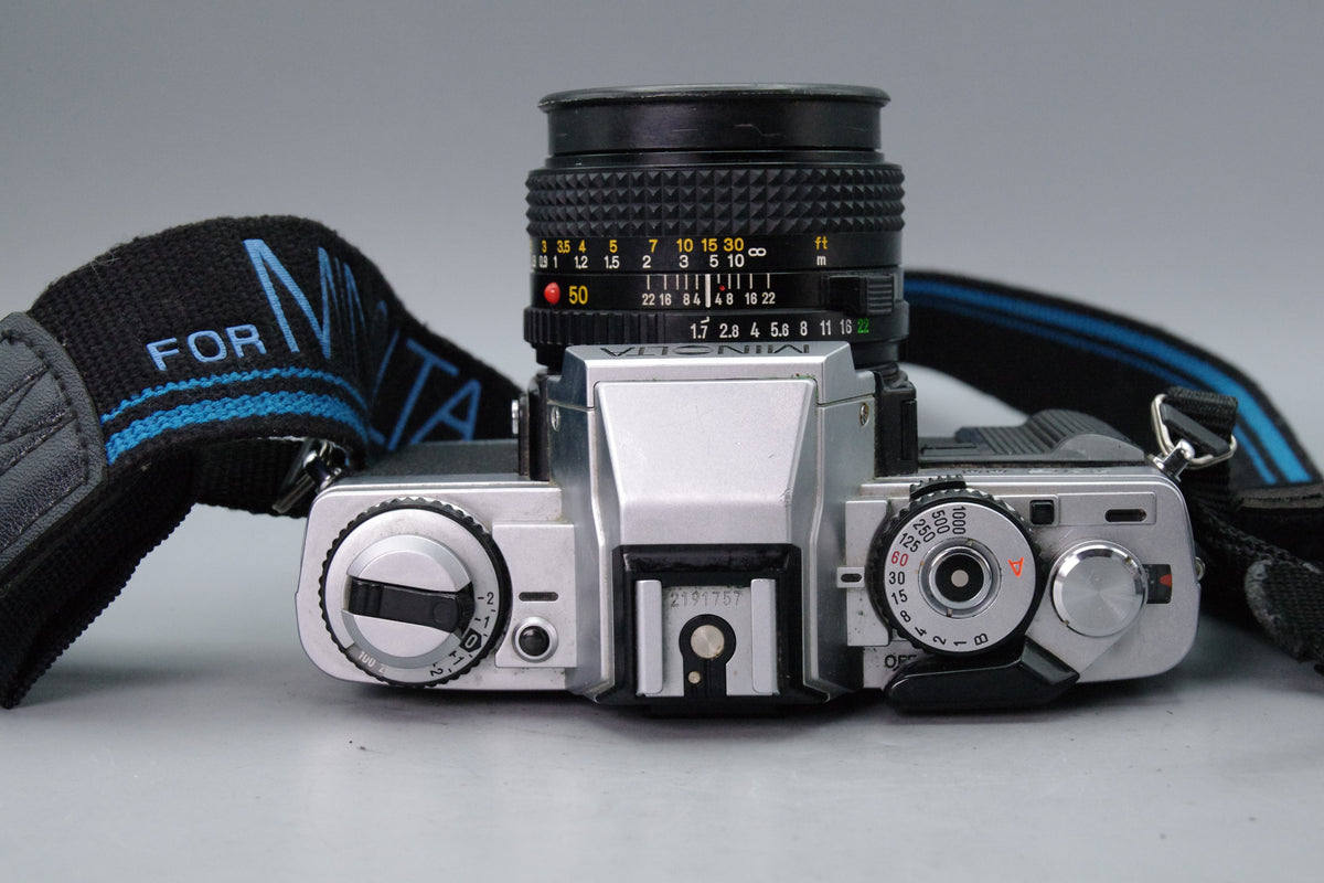 Minolta XG‑M 35mm SLR + MD 50mm f/1.7 Lens – Excellent