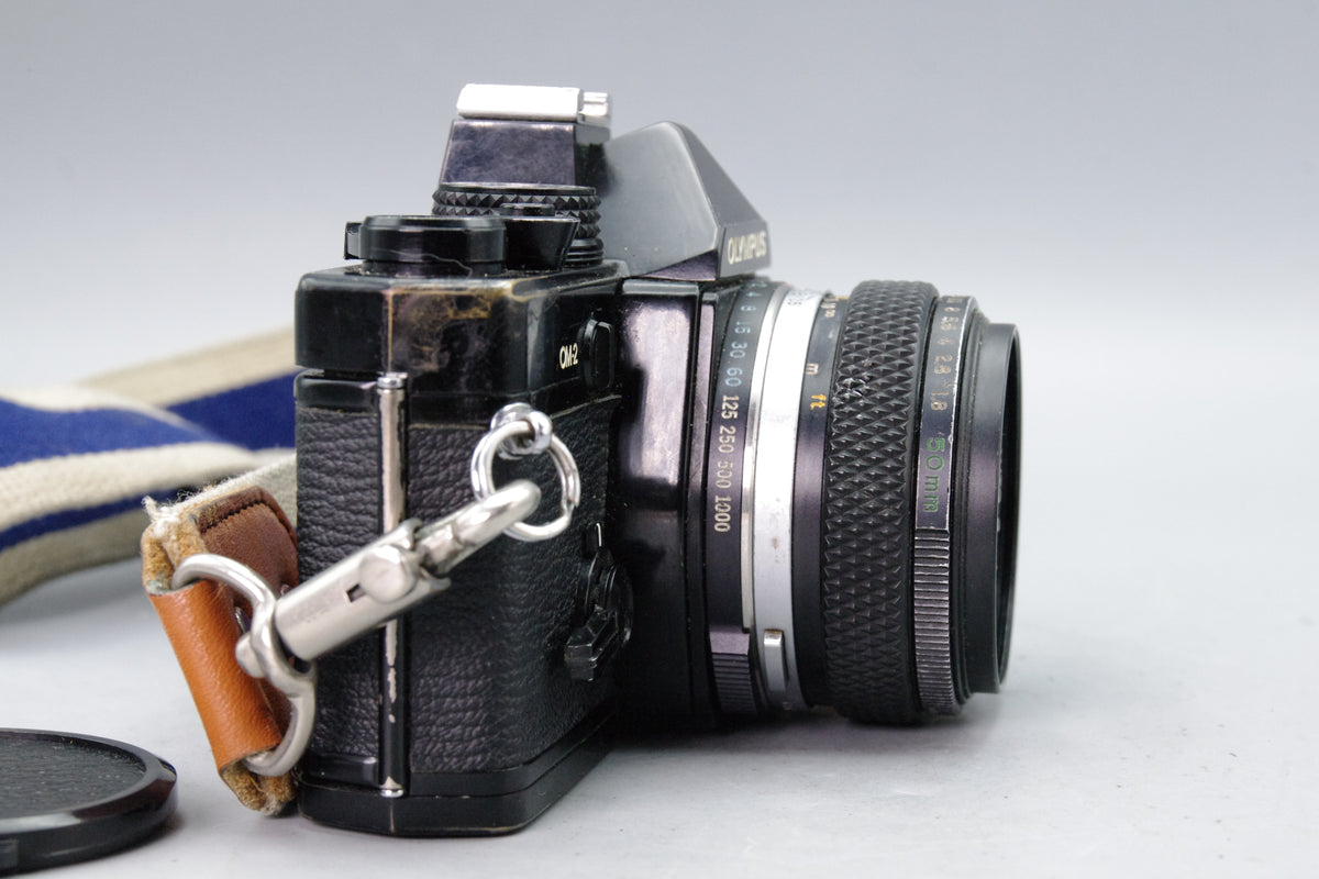 Olympus OM‑2 Black 35mm SLR + Zuiko 50mm f/1.8 Lens – VGC