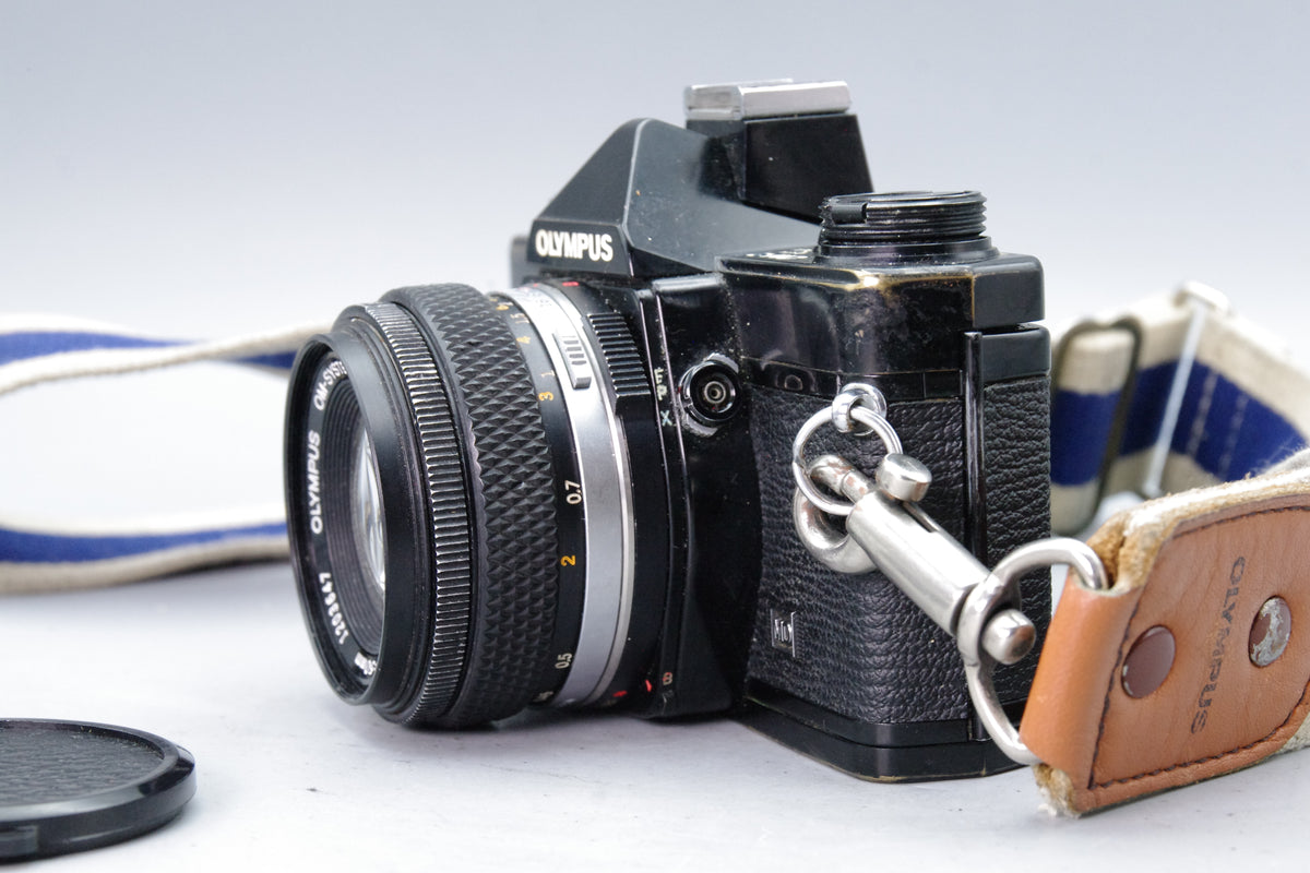 Olympus OM‑2 Black 35mm SLR + Zuiko 50mm f/1.8 Lens – VGC