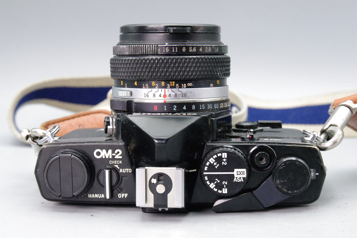 Olympus OM‑2 Black 35mm SLR + Zuiko 50mm f/1.8 Lens – VGC