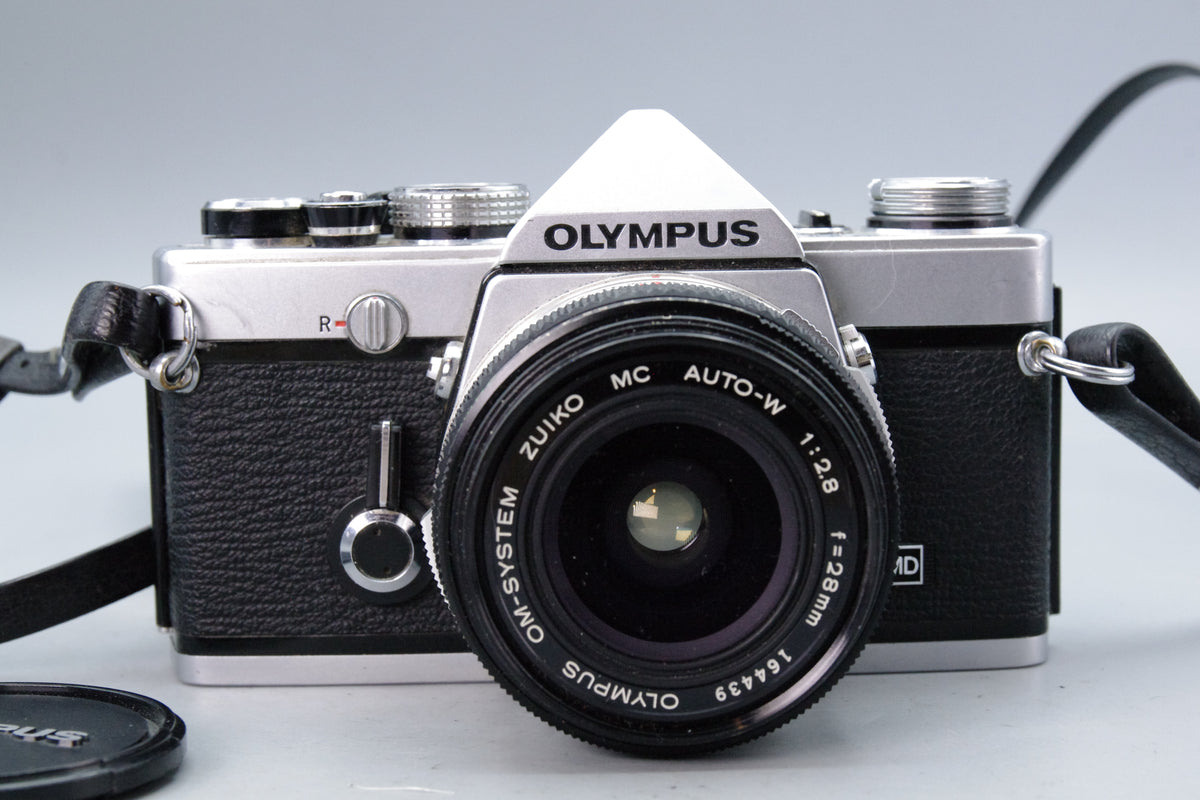 Olympus OM‑1N 35mm SLR Film Camera + Zuiko 50mm f/1.8 Lens – Very Good