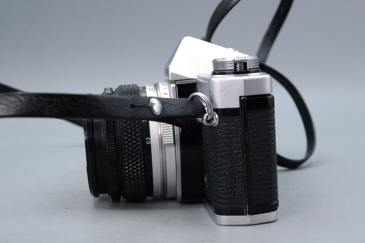 Olympus OM‑1N 35mm SLR Film Camera + Zuiko 50mm f/1.8 Lens – Very Good