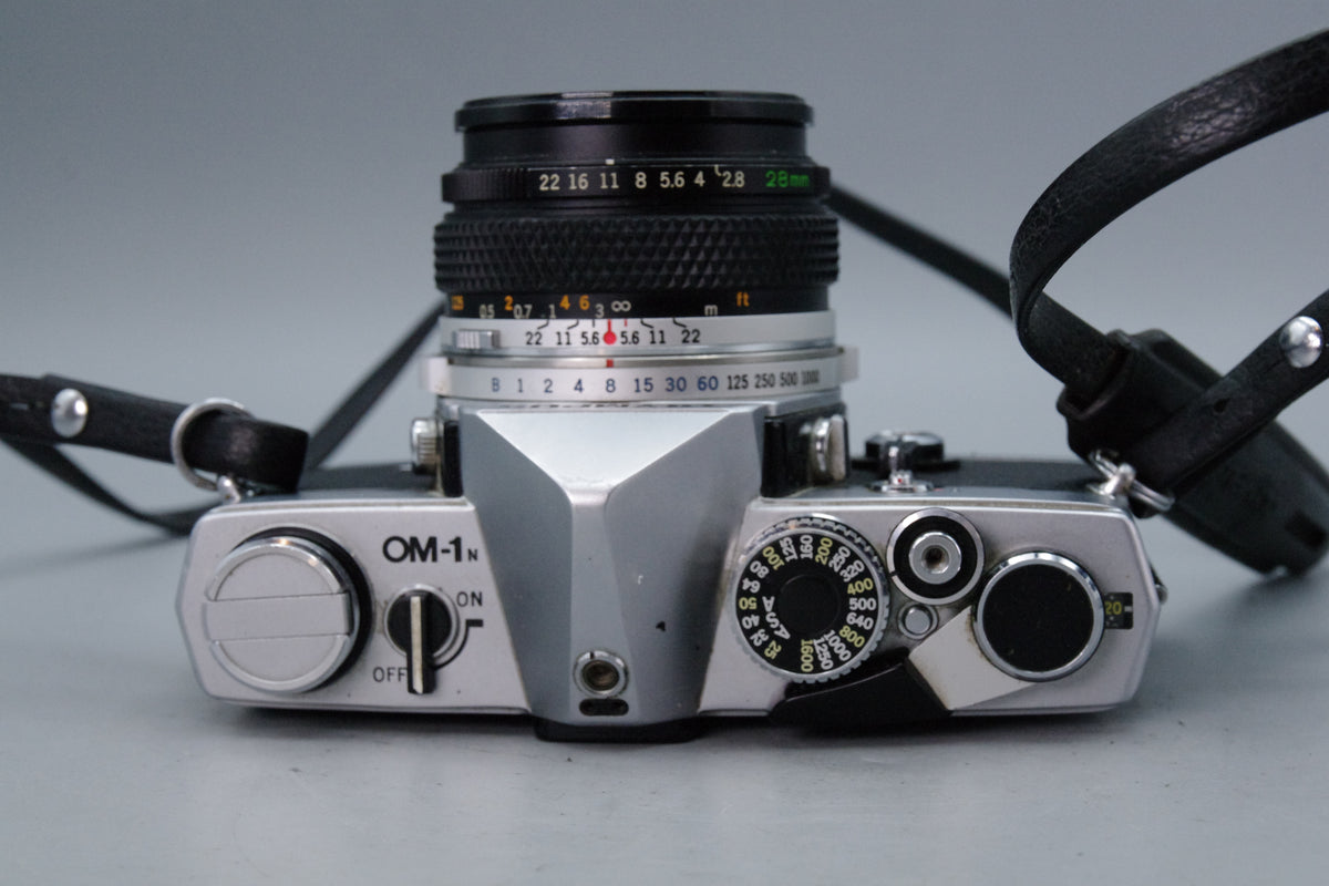 Olympus OM‑1N 35mm SLR Film Camera + Zuiko 50mm f/1.8 Lens – Very Good