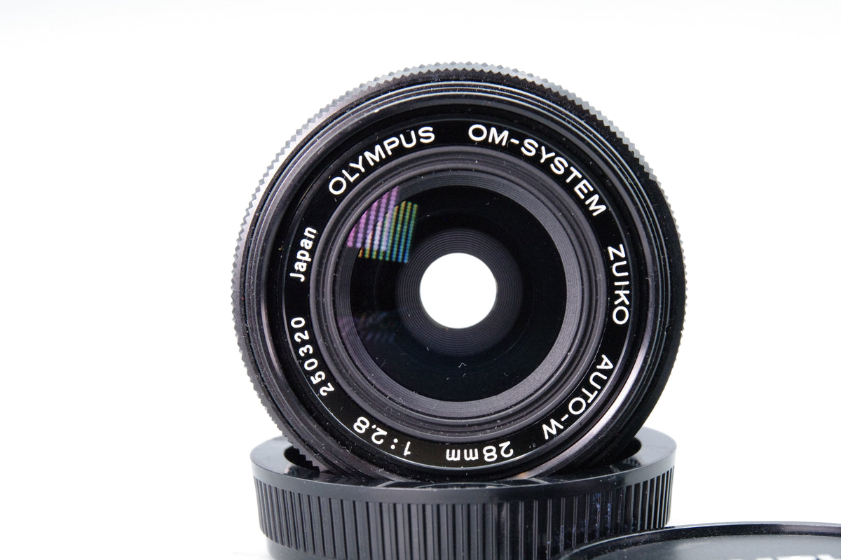 Olympus Zuiko Auto-W 28mm f/2.8 Wide Angle Lens – OM Mount – Excellent