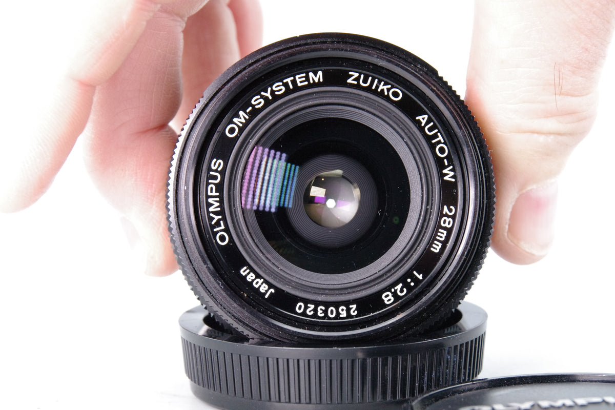 Olympus Zuiko Auto-W 28mm f/2.8 Wide Angle Lens – OM Mount – Excellent