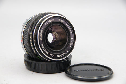 Olympus G.Zuiko Auto‑W 35mm f/2.8 Lens – OM Mount – With Both Caps