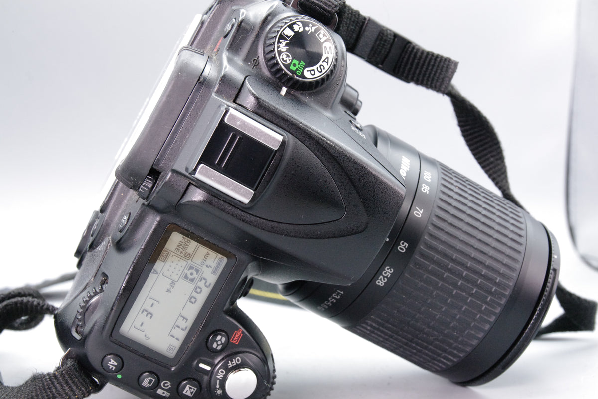 Nikon D90 12.3MP DSLR Camera Body 28-100mm Lens Bag Charger Tested