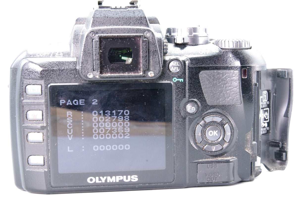 Olympus E-400 DSLR Camera Kit with Zuiko 14-42mm Lens and BCS-1 Charger