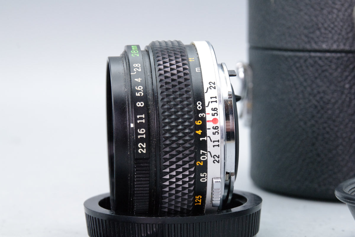 Olympus Zuiko Auto-W 28mm f/2.8 Wide Angle Lens & Case – Excellent