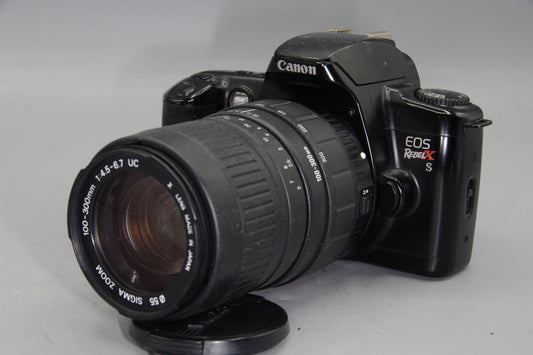 Canon EOS Rebel XS 35mm SLR + Sigma 100–300mm Lens – Excellent