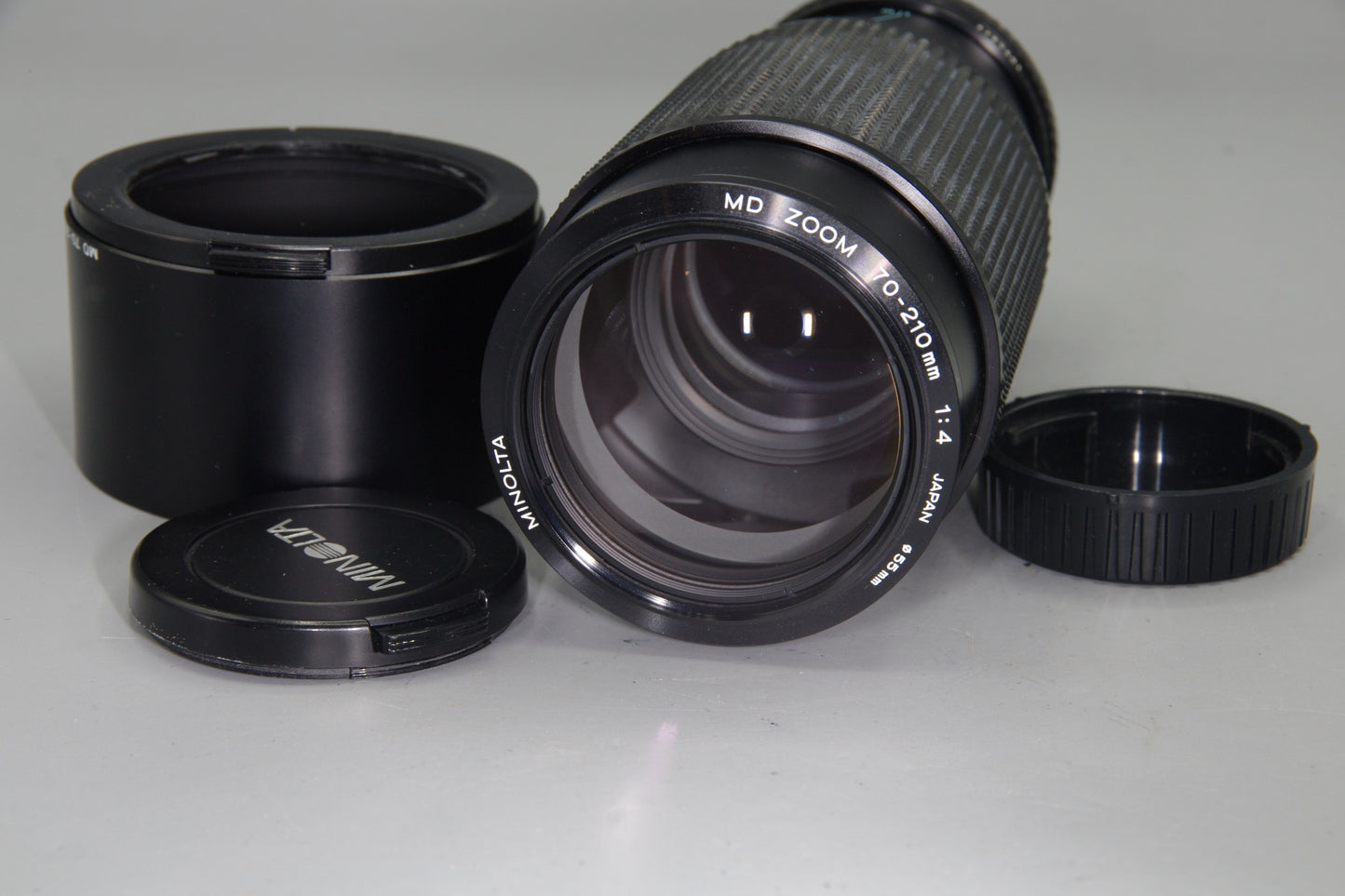Minolta MD Zoom 70–210mm f/4 Lens – Very Good Condition with Hood