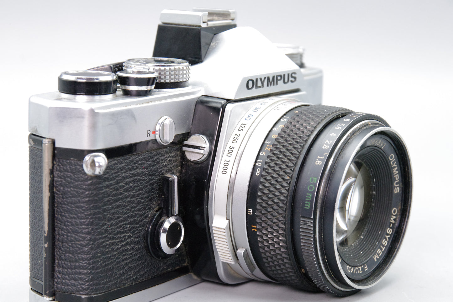 Olympus OM‑1N 35mm SLR Film Camera + Zuiko 50mm f/1.8 Lens – Tested VGC