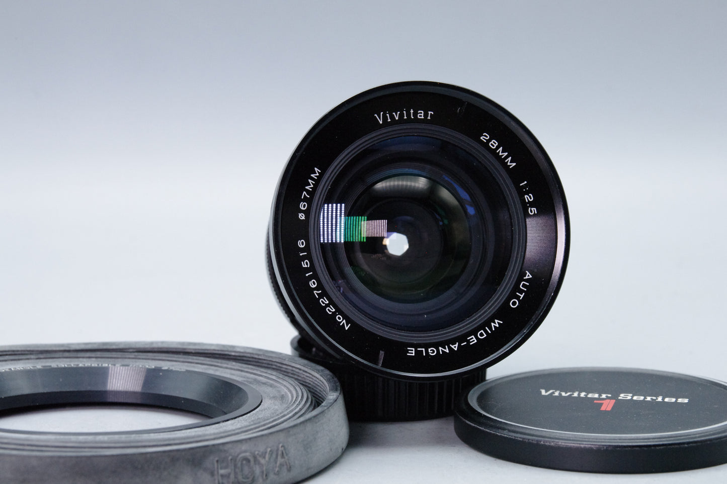 Vivitar 28mm f/2.5 Wide Angle Lens – OM Mount – Very Good – Caps & Hoya Hood