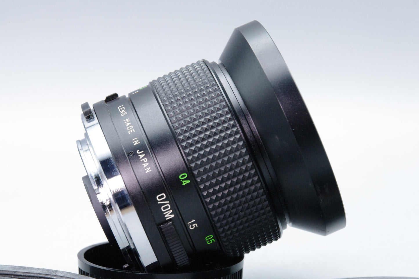 Vivitar 28mm f/2.5 Wide Angle Lens – OM Mount – Very Good – Caps & Hoya Hood
