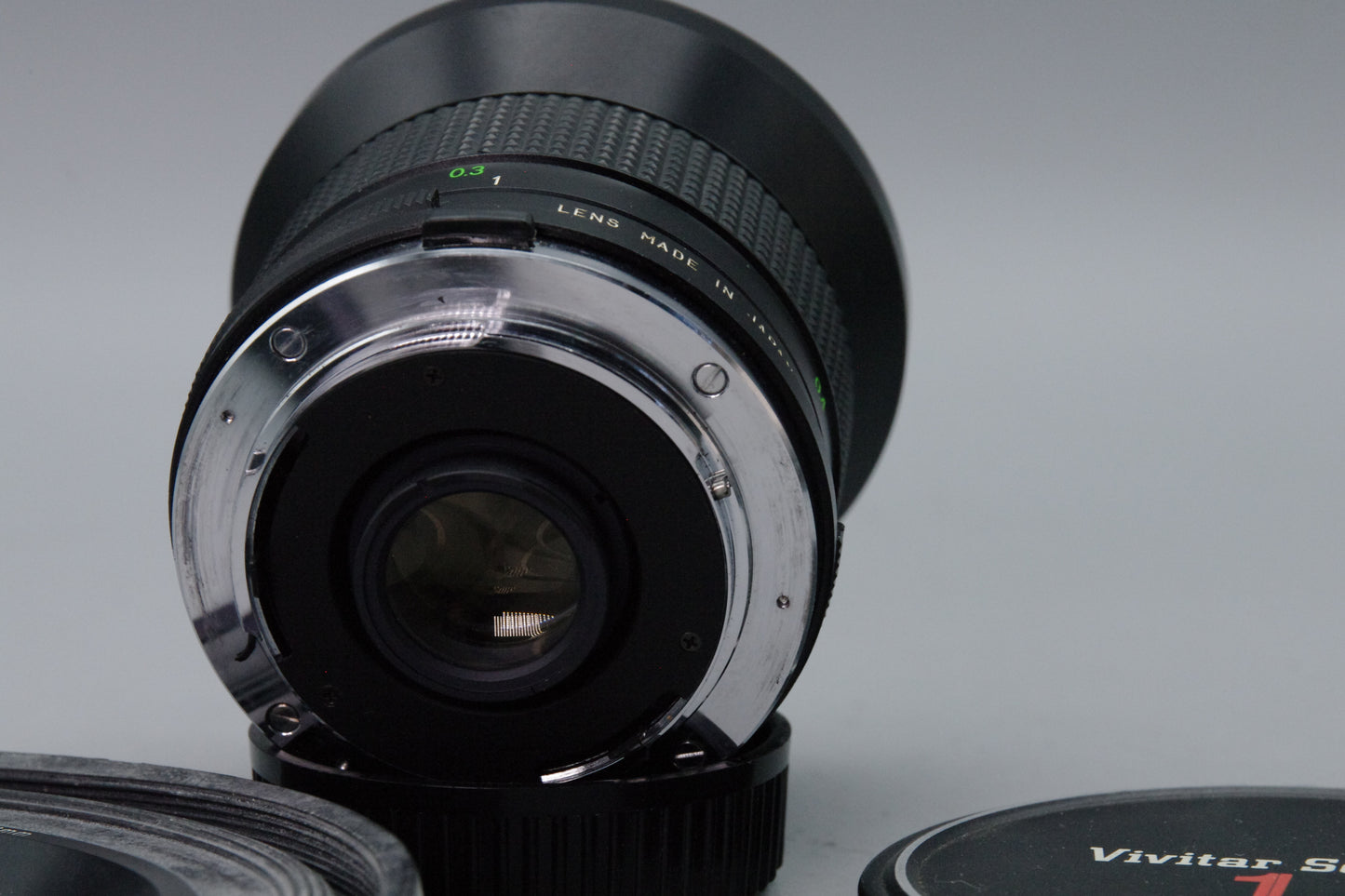 Vivitar 28mm f/2.5 Wide Angle Lens – OM Mount – Very Good – Caps & Hoya Hood