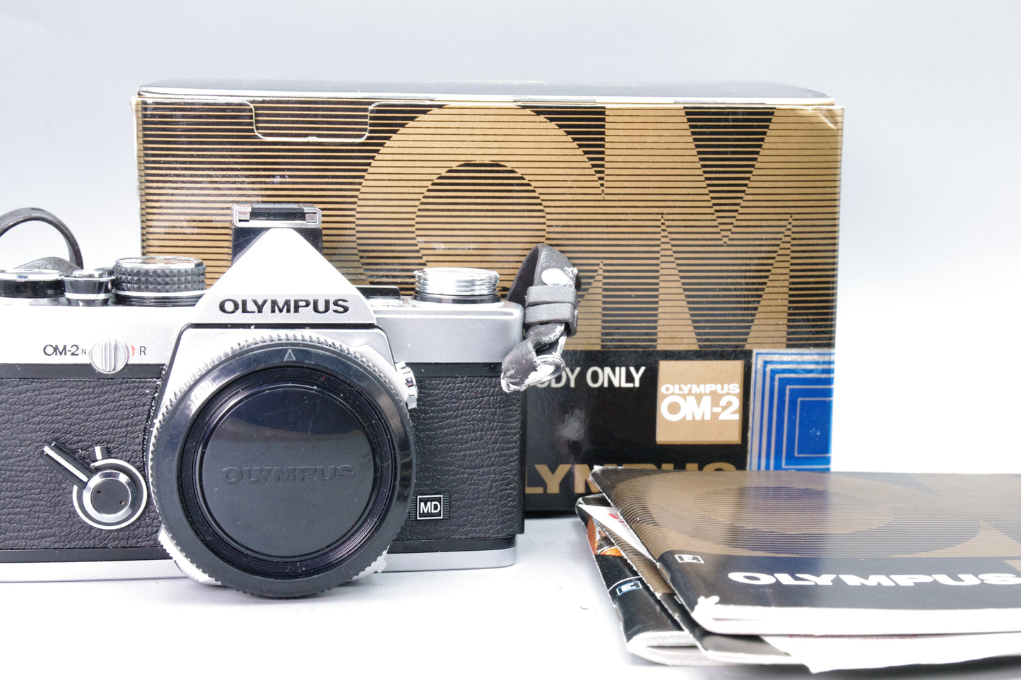 Olympus OM‑2 35mm SLR Camera – Near Mint – Original Box & Paperwork