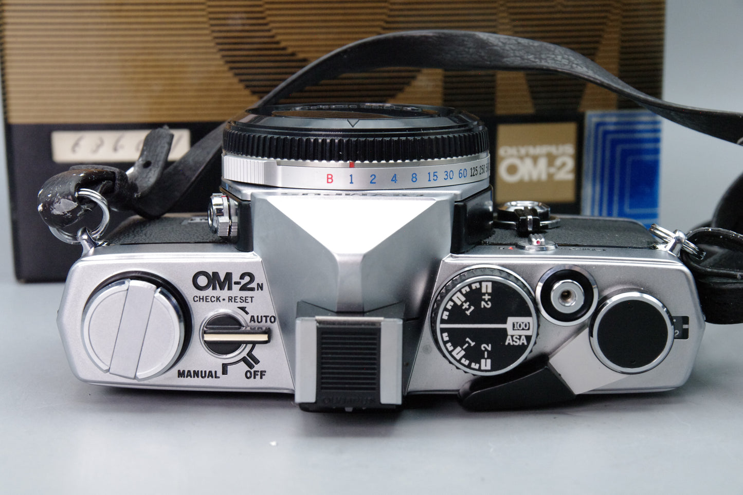 Olympus OM‑2 35mm SLR Camera – Near Mint – Original Box & Paperwork