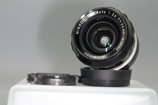 Nikon Nikkor-NC 24mm F/2.8 Pre-AI Lens with caps