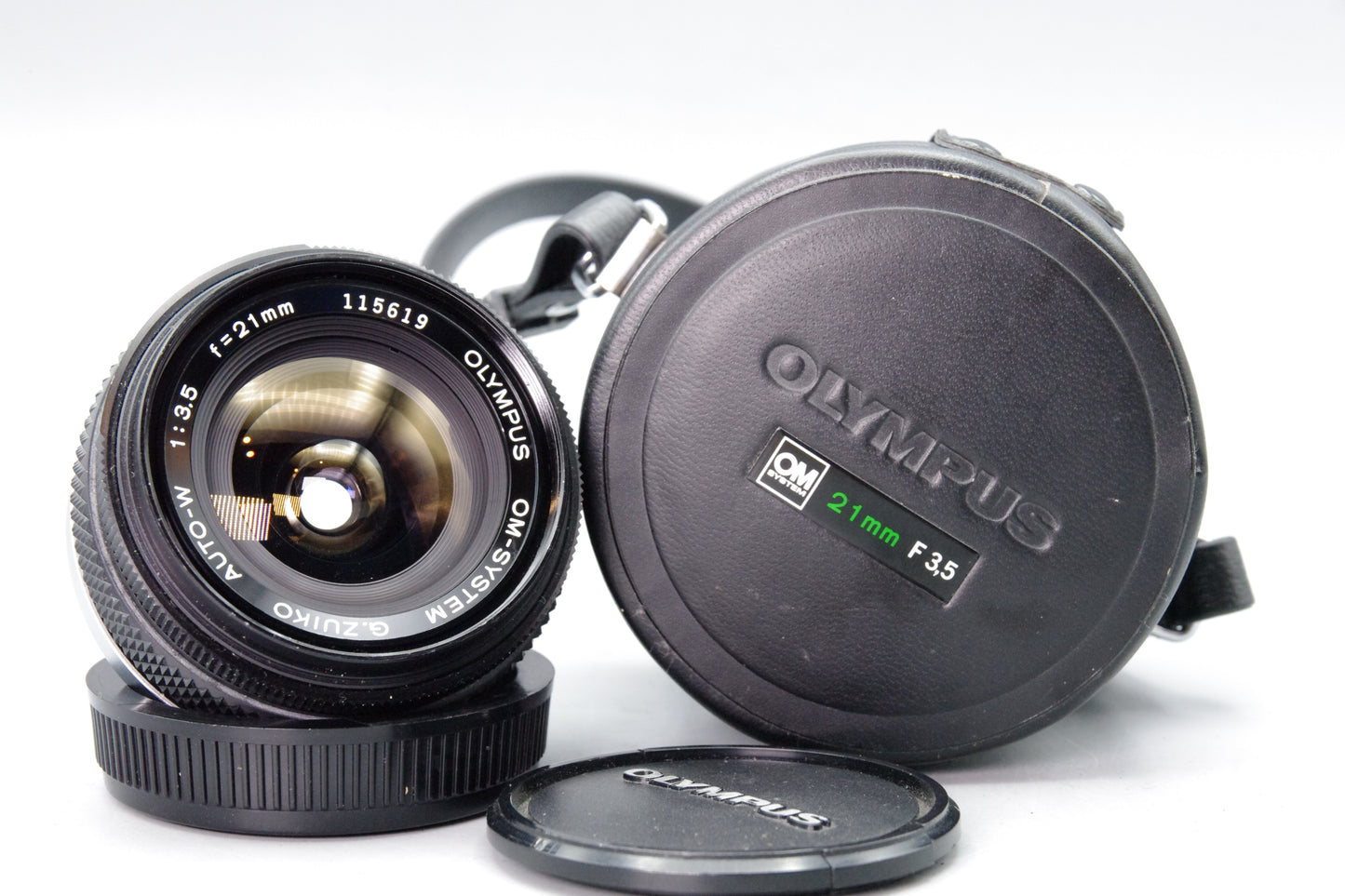 Olympus OM Zuiko MC Auto‑W 21mm f/3.5 Lens – With Caps & Case – Excellent