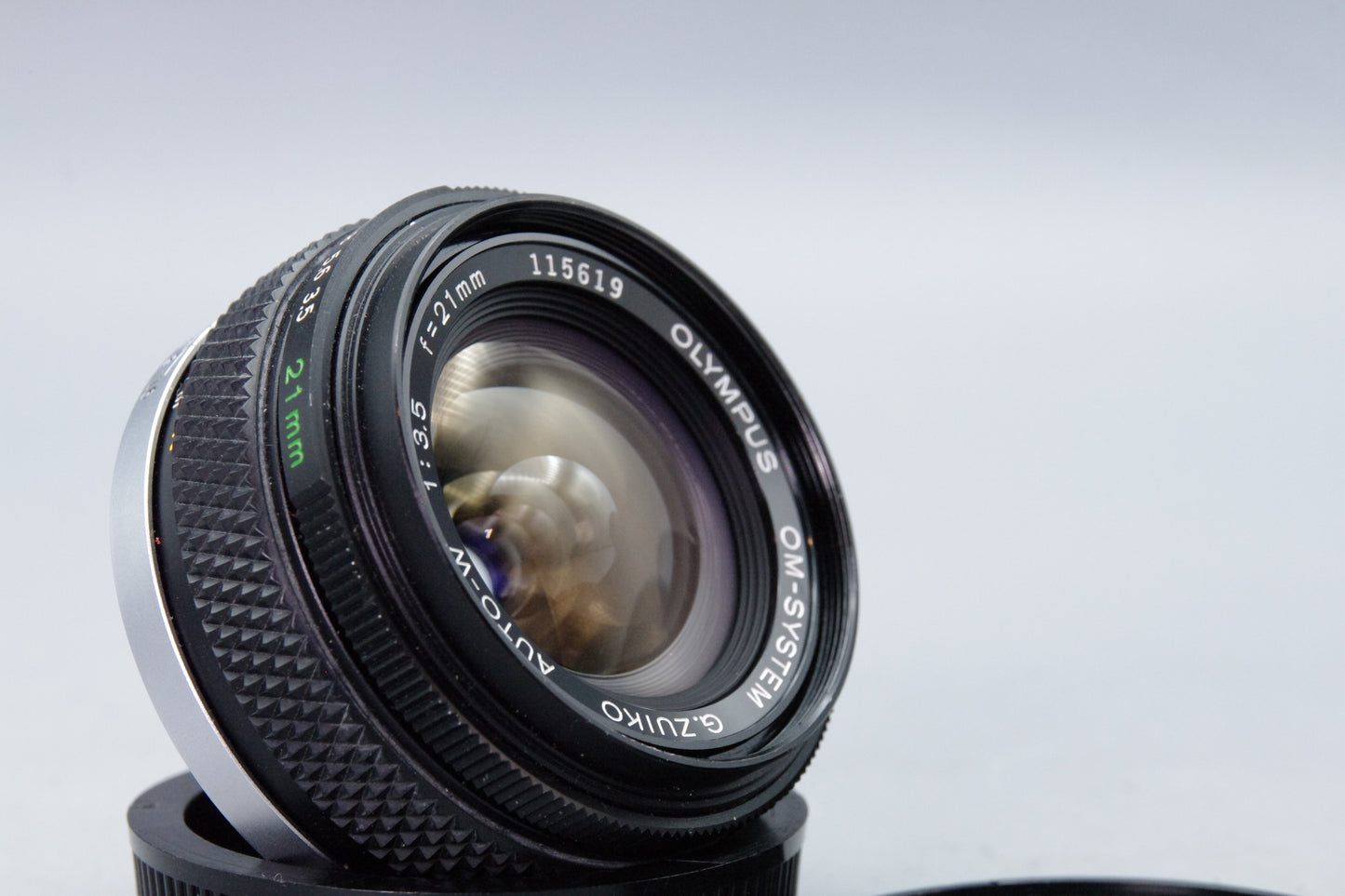 Olympus OM Zuiko MC Auto‑W 21mm f/3.5 Lens – With Caps & Case – Excellent