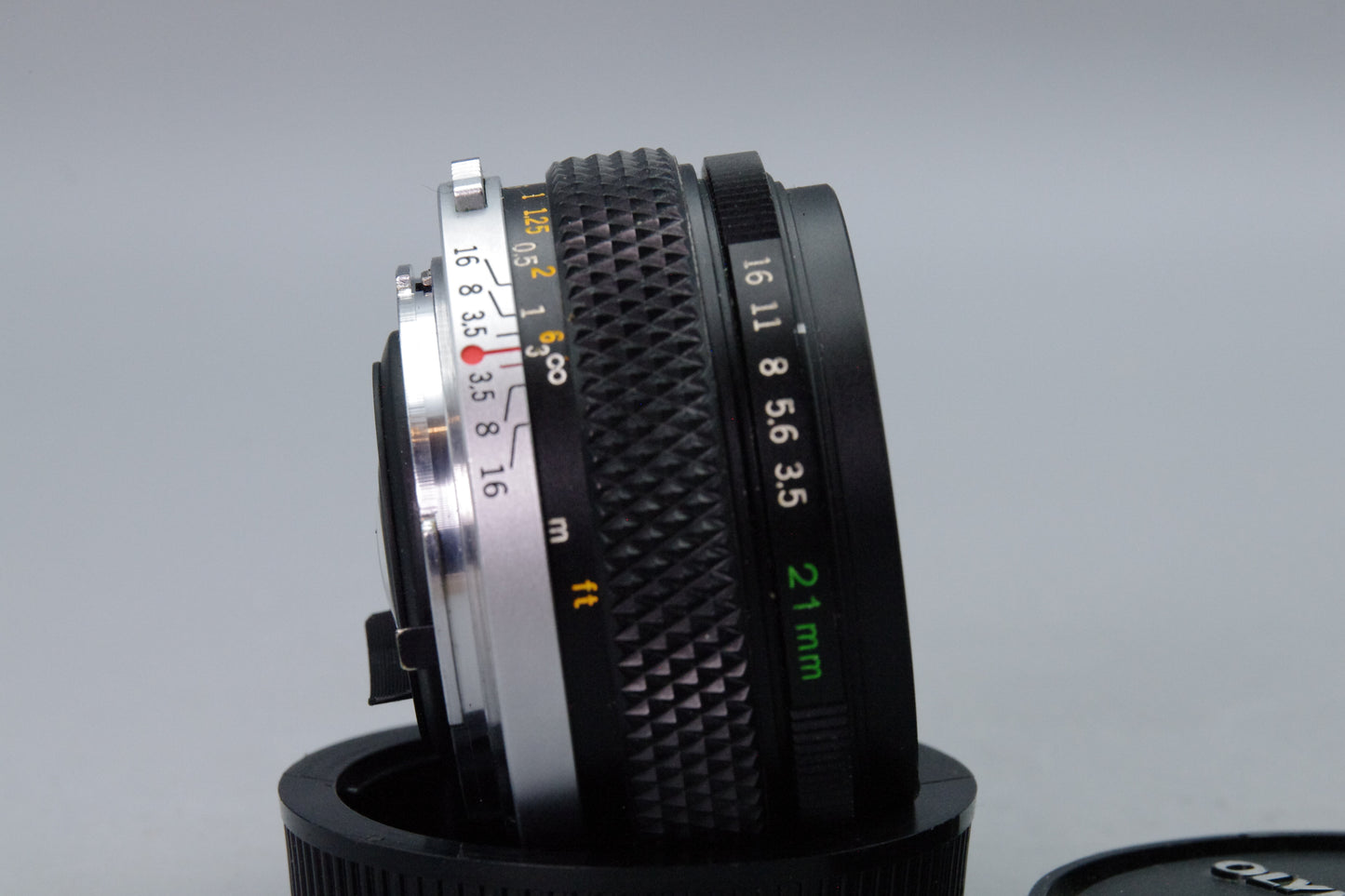 Olympus OM Zuiko MC Auto‑W 21mm f/3.5 Lens – With Caps & Case – Excellent