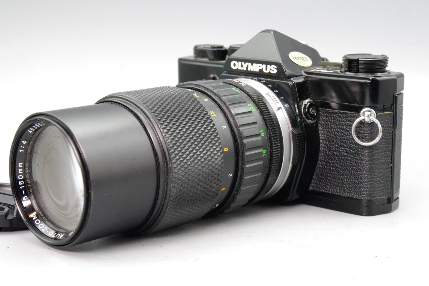 Black Olympus OM‑1 35mm SLR + Zuiko 75–150mm Lens- Tested and Working