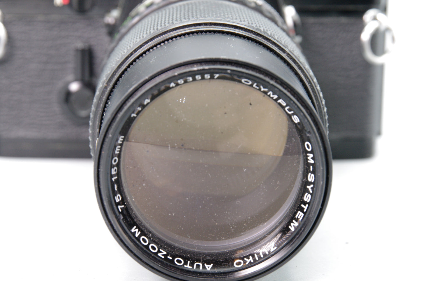 Black Olympus OM‑1 35mm SLR + Zuiko 75–150mm Lens- Tested and Working